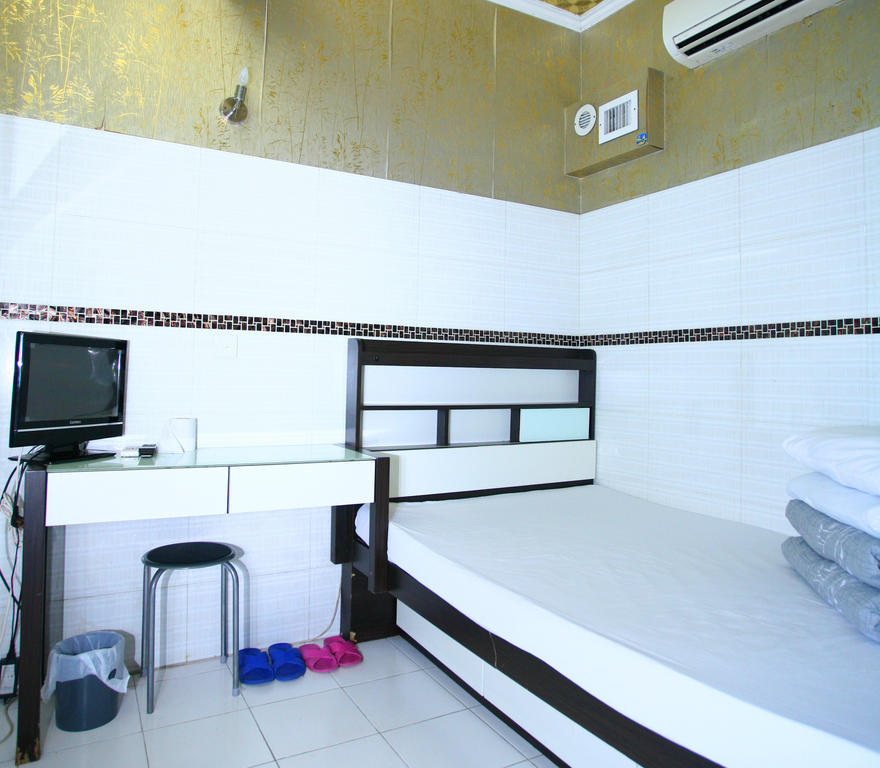 H K Commercial Inn Kowloon Stadt Zimmer foto